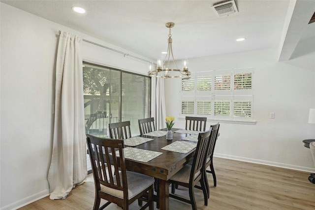 608 Sombrero Dr, Horseshoe Bay, TX 78657 - dining room featuring baseboards, visible vents, plenty of natural light, and light wood finished floors