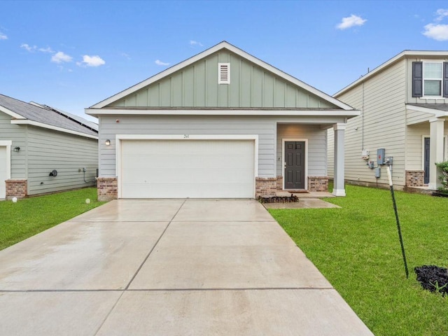 craftsman-style house with brick siding, concrete driveway, an attached garage, board and batten siding, and a front yard