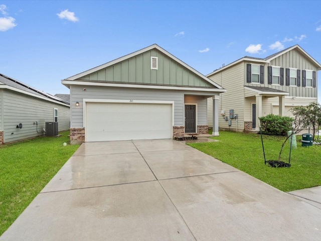 view of front of home with driveway, brick siding, board and batten siding, and a front lawn