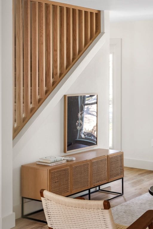 interior space featuring baseboards and wood finished floors