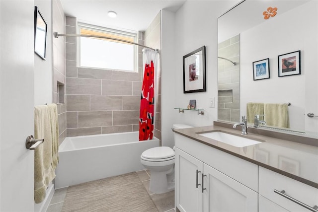 bathroom featuring shower / bath combo, vanity, toilet, and tile patterned floors