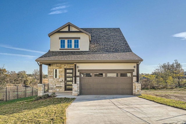 view of front of house featuring roof with shingles, stucco siding, fence, stone siding, and driveway