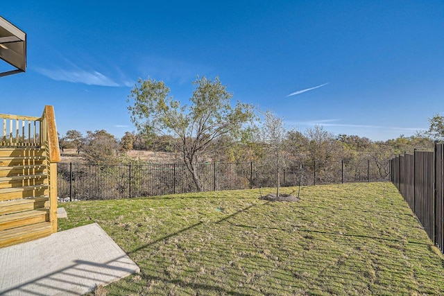 view of yard featuring a fenced backyard