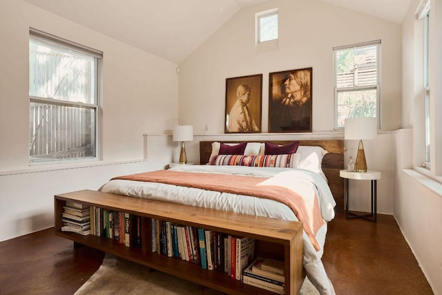 bedroom with lofted ceiling