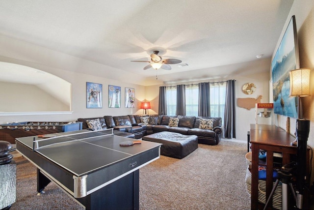 game room with carpet floors, visible vents, a ceiling fan, a textured ceiling, and baseboards