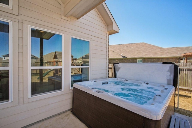 view of patio / terrace featuring a hot tub