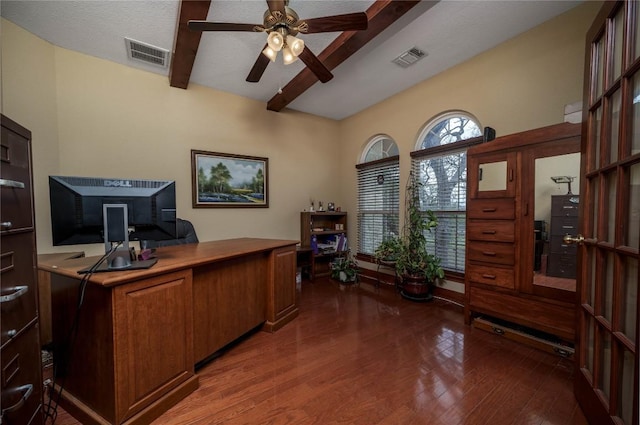 office area featuring ceiling fan, visible vents, beamed ceiling, and wood finished floors