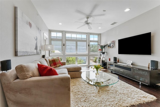 living room with recessed lighting, dark wood-style flooring, visible vents, and ceiling fan