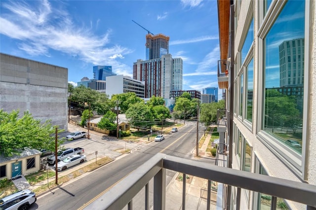 balcony featuring a view of city