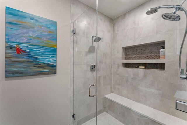 bathroom featuring a shower stall