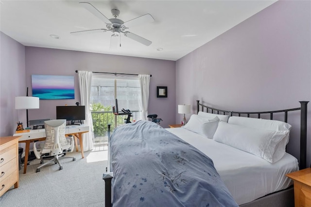 carpeted bedroom with access to exterior and a ceiling fan