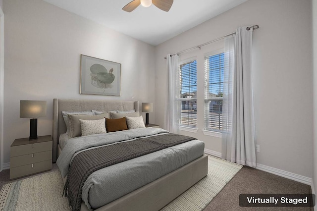 bedroom with carpet floors, baseboards, and a ceiling fan