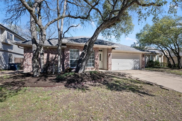 single story home with an attached garage, concrete driveway, and brick siding