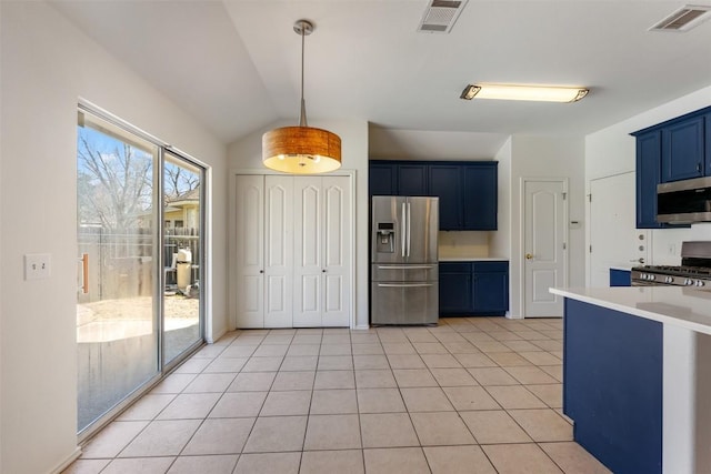 kitchen with blue cabinets, visible vents, stainless steel appliances, and light countertops