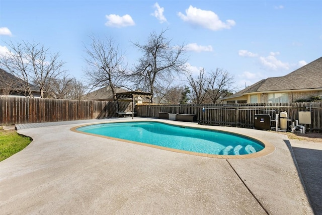 view of swimming pool with a fenced in pool, a patio area, and a fenced backyard