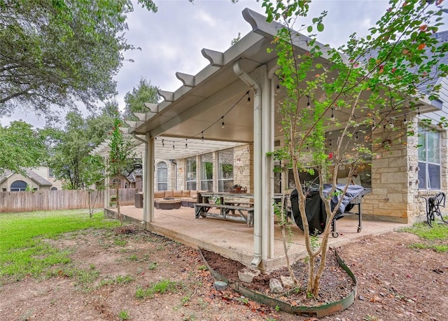 view of yard featuring fence and a patio