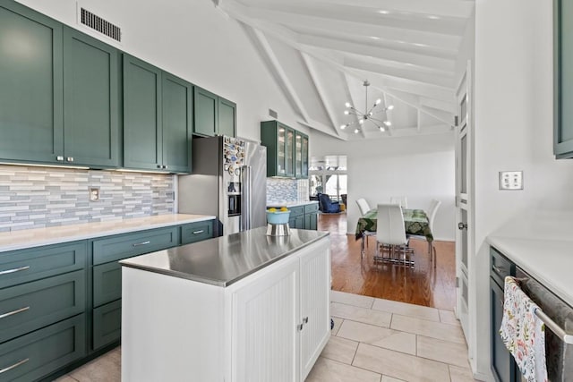 kitchen featuring visible vents, a notable chandelier, light tile patterned flooring, stainless steel fridge with ice dispenser, and green cabinetry