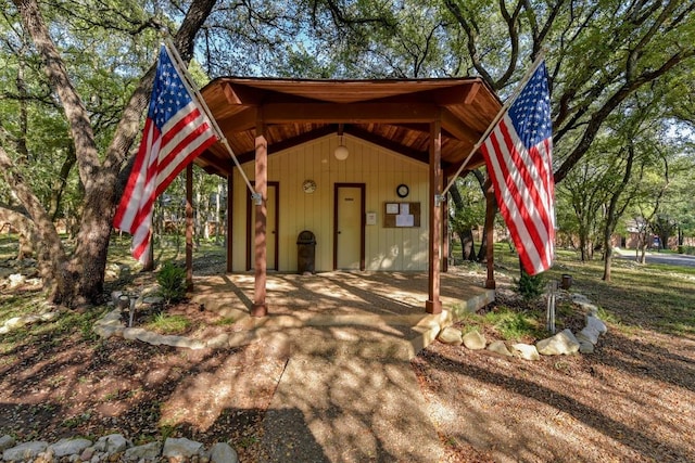 exterior space with dirt driveway