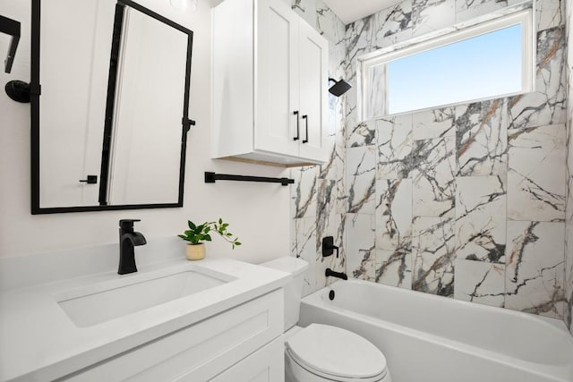 full bath featuring toilet, vanity, and  shower combination