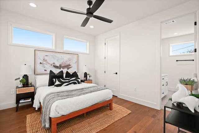 bedroom with wood finished floors, recessed lighting, baseboards, and ceiling fan