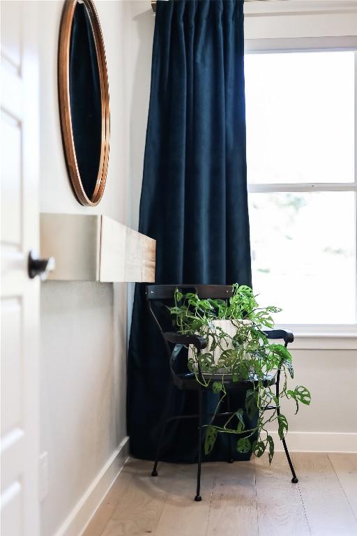 interior space featuring baseboards