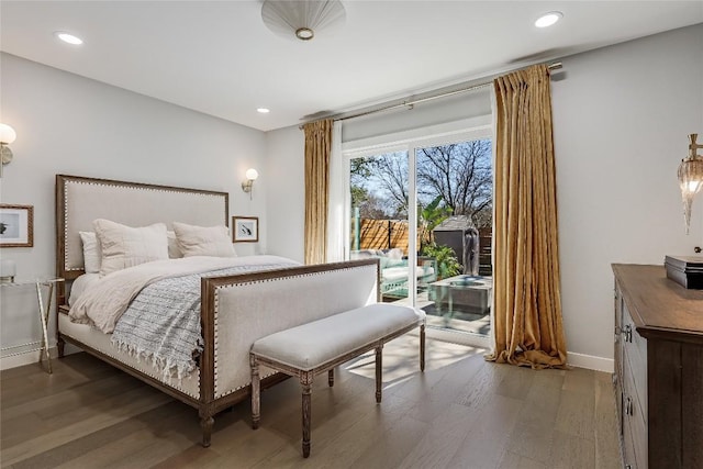 bedroom featuring baseboards, access to outside, wood finished floors, and recessed lighting