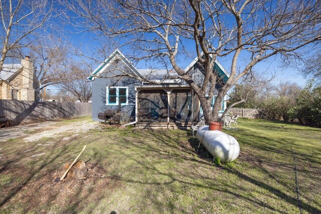 exterior space featuring a fenced backyard