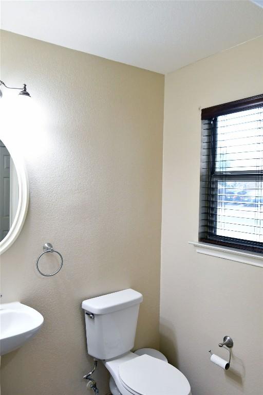 bathroom with a sink and toilet