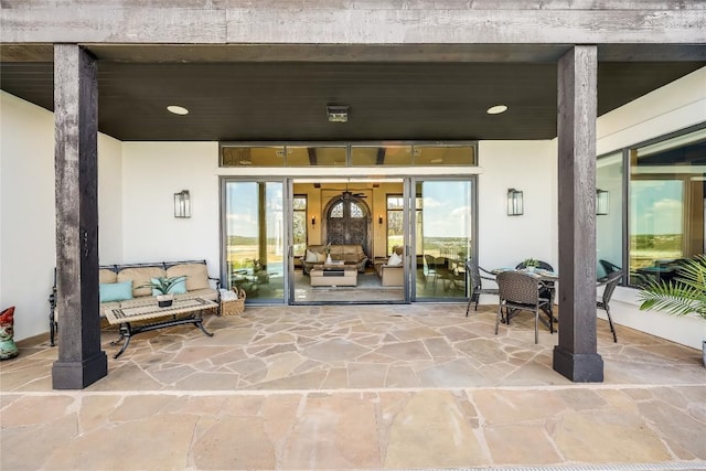 1208 Watercliffe Dr, Lago Vista, TX 78645 - doorway to property featuring french doors and stucco siding