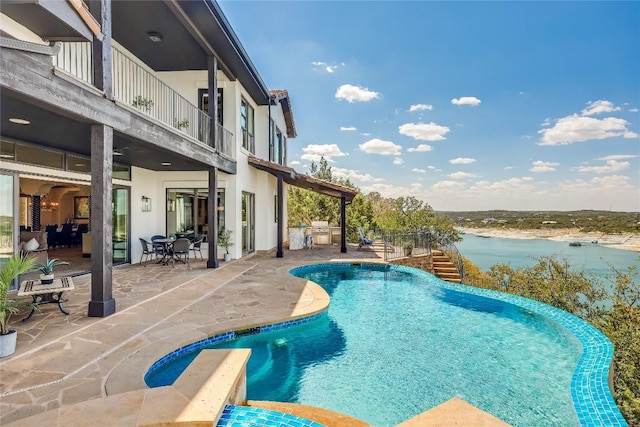 1208 Watercliffe Dr, Lago Vista, TX 78645 - pool featuring a water view, a patio area, and outdoor dining area
