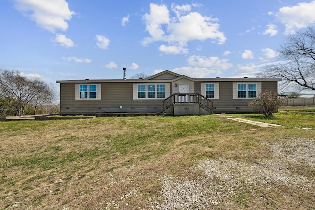 exterior space with crawl space and a front yard