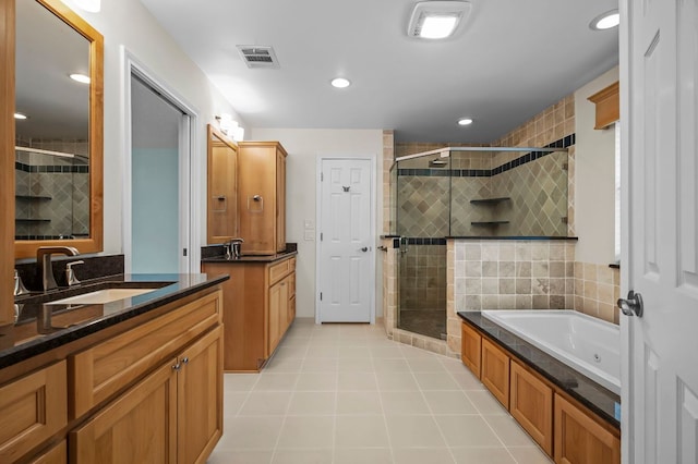 full bath with tile patterned flooring, a sink, visible vents, a shower stall, and a bath