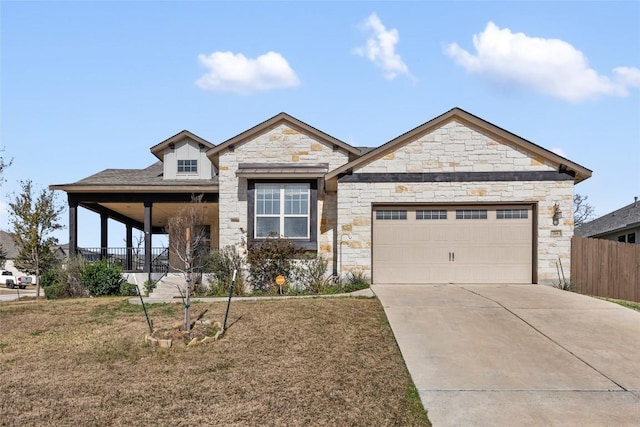 view of front of property with an attached garage, driveway, and a front lawn