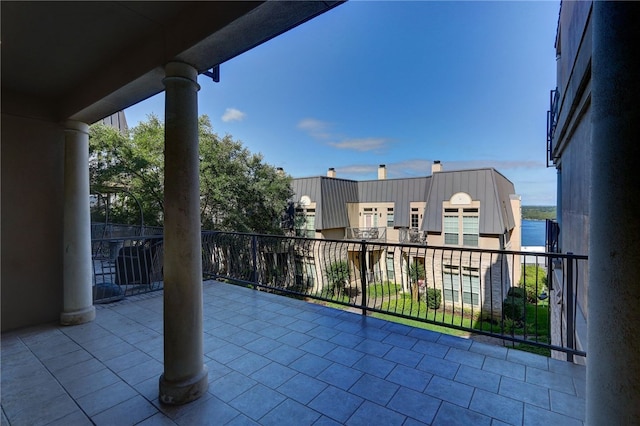 view of patio with a balcony