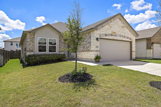 view of front of property with concrete driveway, a front yard, fence, a garage, and stone siding