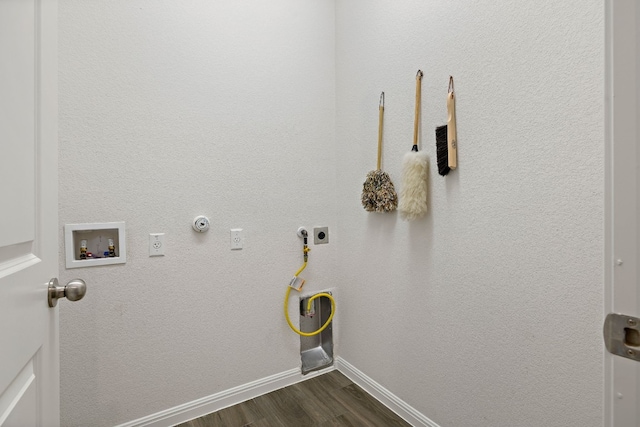 laundry room featuring hookup for a gas dryer, laundry area, washer hookup, dark wood finished floors, and electric dryer hookup