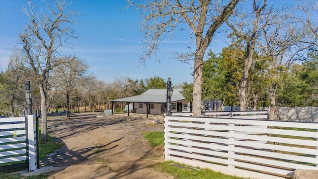 exterior space with a fenced front yard