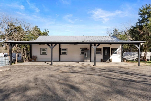 240 Riddle Rd, Cedar Creek, TX 78612 - view of front of house featuring metal roof