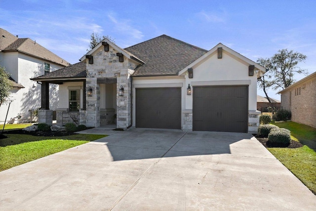 view of front of property featuring roof with shingles, stucco siding, concrete driveway, an attached garage, and stone siding