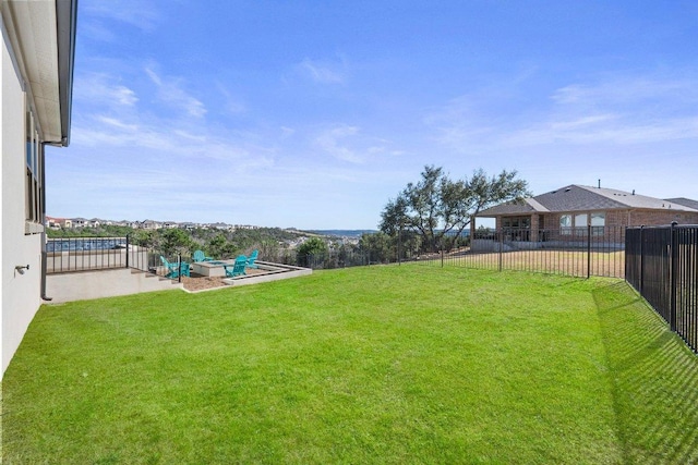 view of yard with a fenced backyard