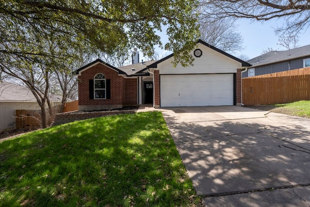 ranch-style home featuring brick siding, fence, driveway, and an attached garage