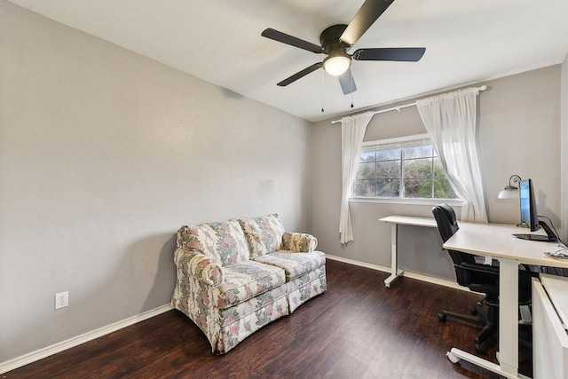 office space with a ceiling fan, baseboards, and wood finished floors