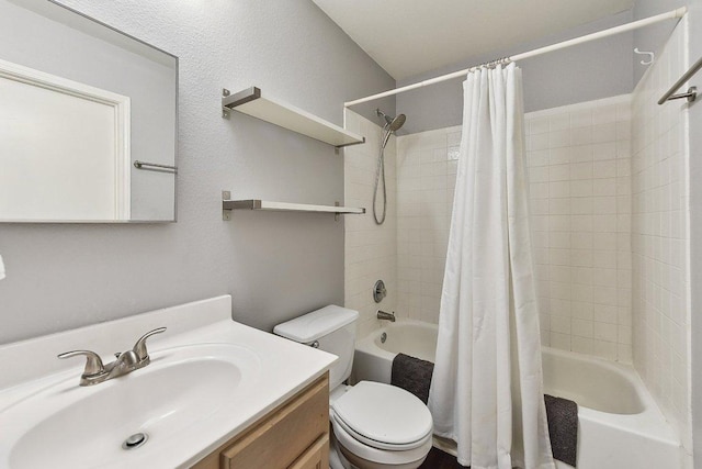 full bathroom with toilet, shower / bath combo, and vanity