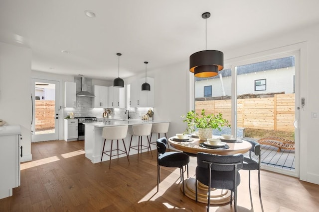 dining space featuring wood finished floors