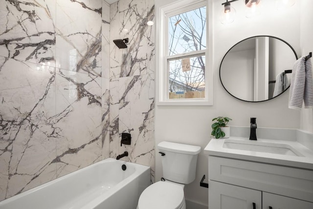 full bath featuring toilet, vanity, and shower / bath combination