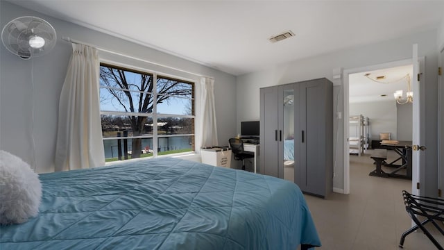 bedroom featuring visible vents