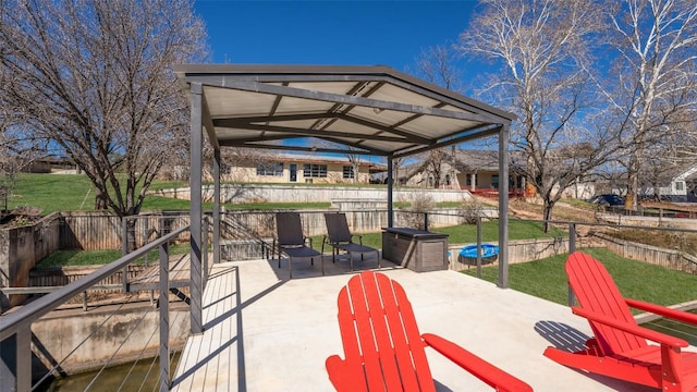 view of patio with fence