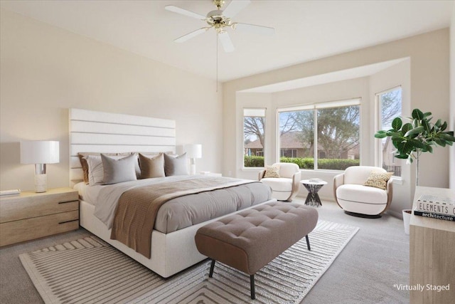 bedroom featuring a ceiling fan and carpet floors