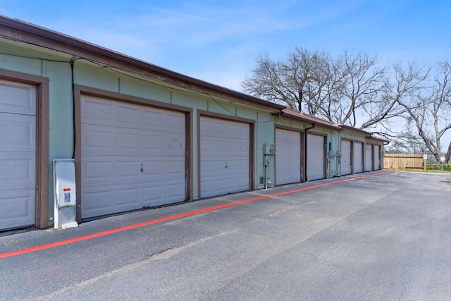 garage featuring fence