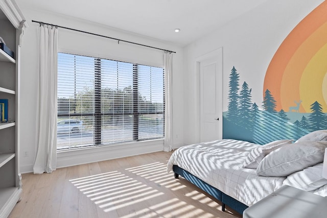 bedroom with wood finished floors